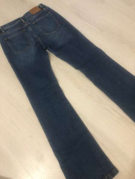 Синие джинсы клёш в Владикавказе