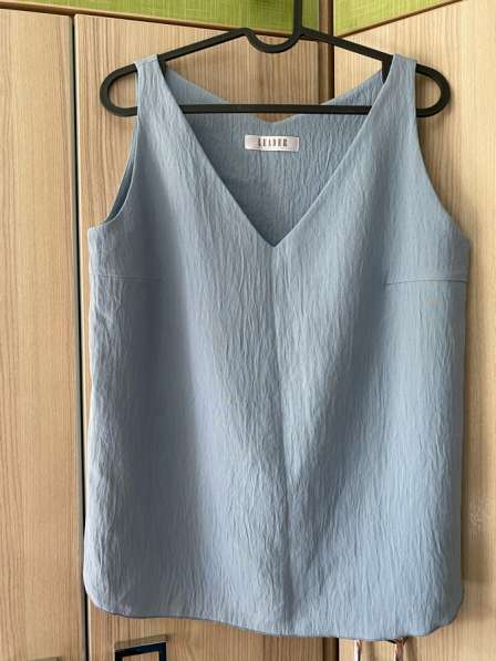 Блузка без рукавов