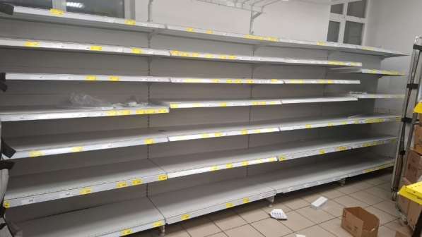 Металлический стеллаж торговый