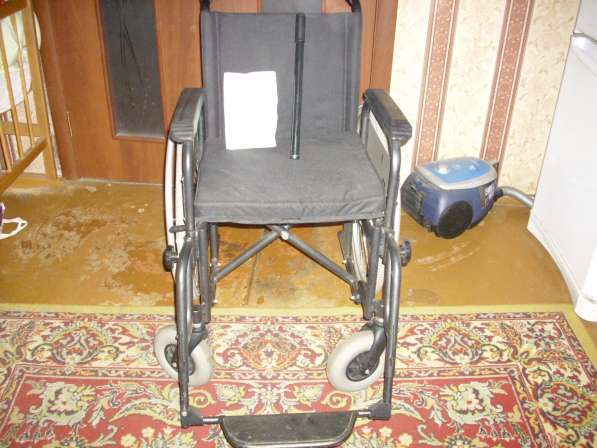 Инвалидная коляска в 