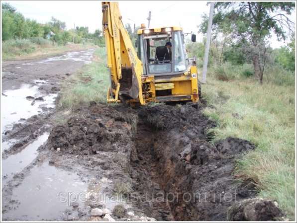 Аренда экскаватора-погрузчикаTerex 860 в Москве фото 3