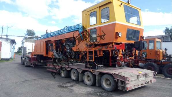 Перевозка тралом складских погрузчиков по России в Омске фото 7