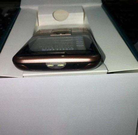 Новый Philips Xenium E331 Brown (полный комплект) в Москве фото 4