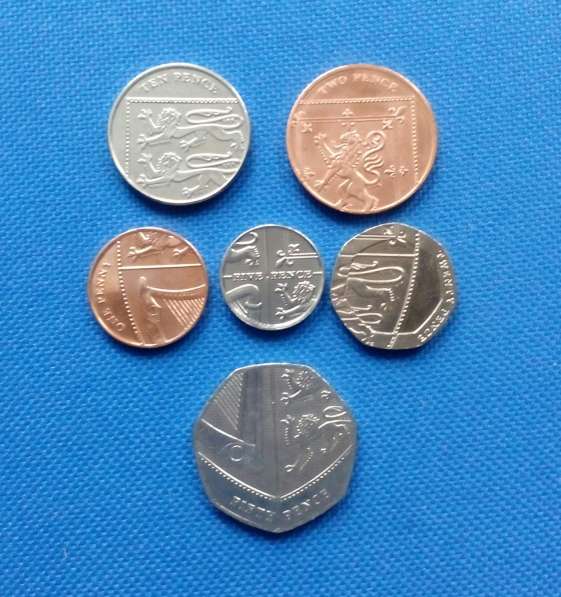 Монеты Великобритании. Щит (герб) королевы