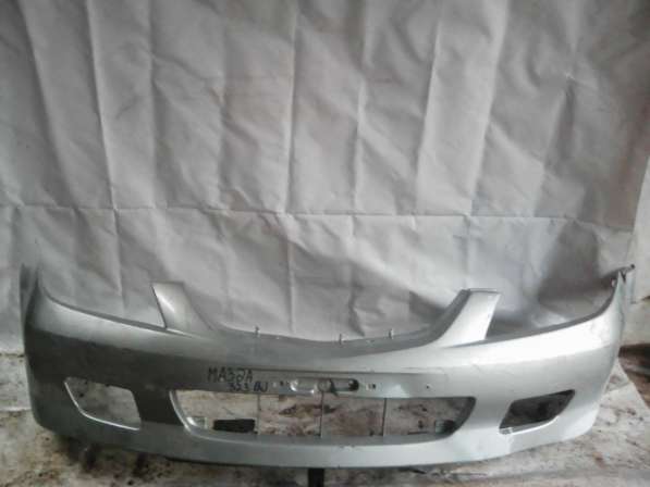 Передний бампер Mazda 323 BJ