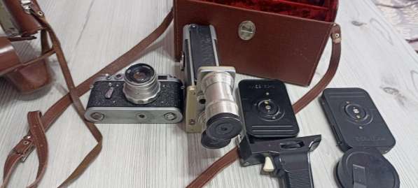Видеокамера и фотоопарат